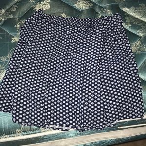 Dark blue skirt decorated with white flowers